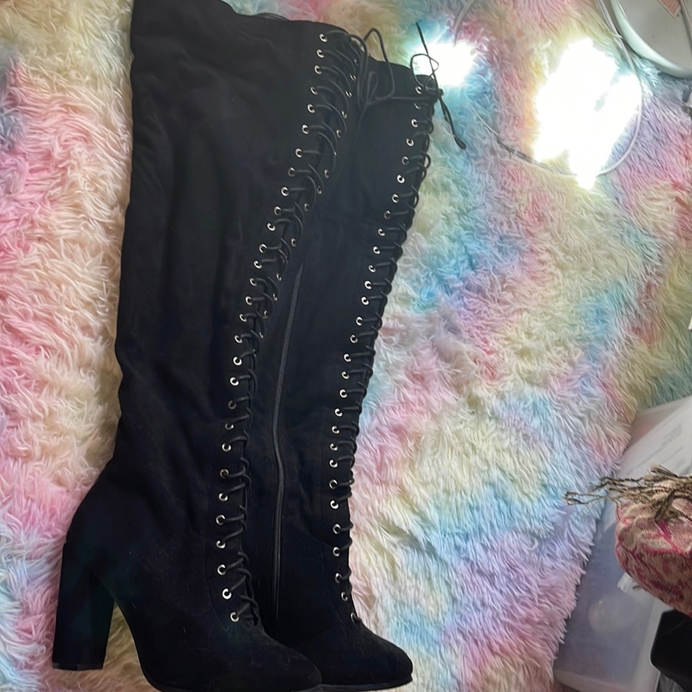 Thigh high boots.